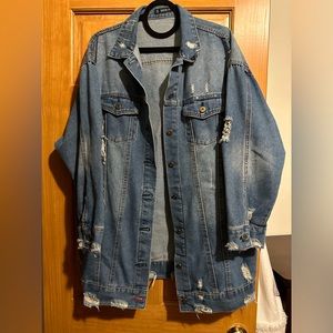 NWOT thigh length distressed jean jacket. Size L